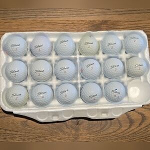 17 Titleist ProV1x white golf balls. Mint 5A+ playing condition.